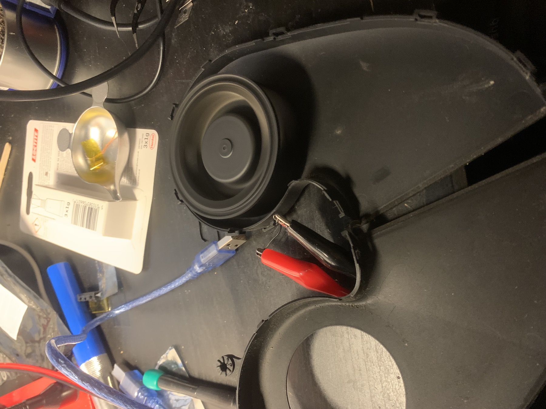 Salvaged iMac centrifugal blower spinning during its first powered bench test