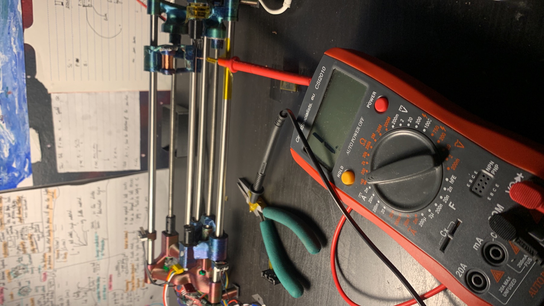 Continuity tester attached to a multi-ply artificial muscle during fabrication